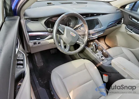 2023 Cadillac Xt4 Luxury from USA, damaged, VIN 1GYAZAR41PF119232